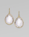 A bold faceted teardrop of clear quartz shimmers within a delicate setting of 18k gold. Clear quartz 18k yellow gold Drop, about 1½ Ear wire Imported