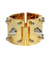 Tough goes luxe with this silver and gold punk-inspired stud cuff from New York Jewelry designer Eddie Borgo - Large gold-plated cuff with silver spike and stud embellishment and hinge closure - Pair with a figure-hugging cocktail sheath or an elevated jeans-and-tee ensemble