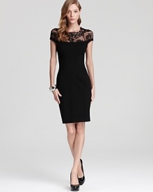 An undisputed classic, ABS by Allen Schwartz's timeless L.B.D. showcases intricate lace details on an iconic silhouette. An undisputed classic, ABS by Allen Schwartz's timeless L.B.D. showcases intricate lace details on an iconic silhouette.