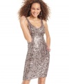 Sequins and pailettes of varying sizes sparkle atop City Studio's sleek tank dress!