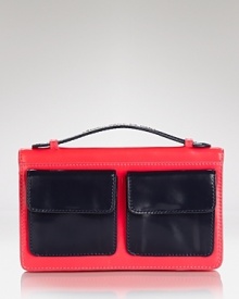 Get a handle on the color block trend with MARC BY MARC JACOBS' patent leather clutch. Boasting bold pockets and a boxy shape, this mini pops with denim and a camel coat. Get a handle on the color block trend with MARC BY MARC JACOBS' patent leather clutch. Boasting bold pockets and a boxy shape, this mini pops with denim and a camel coat.