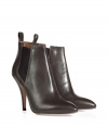 Turn up the volume on your workweek look with these sexy ankle booties from LAutre Chose - Pointed toe, slip-on style, elasticized side panel, back loop detail, stiletto heel - Style with a pencil skirt, a tie-neck blouse, and a tailored blazer