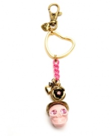 Ghoulish yet girly. Betsey Johnson adds feminine flair to this spooky skull-themed key chain. Featuring an array of decorative details--including bow and heart charms, plus flower accents and chain link embellishment--it's crafted in antique gold tone and brass tone mixed metal. Comes with a gift box. Approximate length: 6-1/4 inches. Ghoulish yet girly. Betsey Johnson adds feminine flair to this spooky skull-themed key chain. Featuring an array of decorative details--including bow and heart charms, plus flower accents and chain link embellishment--it's crafted in antique gold tone and brass tone mixed metal. Comes with a gift box. Approximate length: 6-1/4 inches.