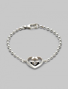 From the Love Britt Collection. Signature interlocking G in an iconic heart shape accents the wrist beautifully. Sterling silver Width of heart, about ¾ Length, about 6½ Lobster clasp closure Made in Italy From the Love Britt Collection. Signature interlocking G in an iconic heart shape accents the wrist beautifully. Sterling silver Width of heart, about ¾ Length, about 6½ Lobster clasp closure Made in Italy