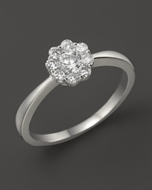 Faceted diamonds in 14K white gold flower setting. Faceted diamonds in 14K white gold flower setting.