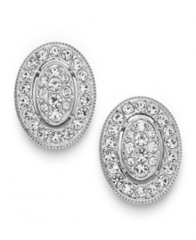 The perfect accent comes in a pretty oval-shaped package. Eliot Danori's Windsor stud earrings feature an intricate design in round-cut crystal. Set in rhodium-plated silver tone mixed metal. Approximate diameter: 1/2 inch. The perfect accent comes in a pretty oval-shaped package. Eliot Danori's Windsor stud earrings feature an intricate design in round-cut crystal. Set in rhodium-plated silver tone mixed metal. Approximate diameter: 1/2 inch.