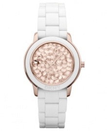 Glistening rosy crystals create a captivating appearance on this DKNY watch.