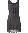 Stylish dress made ​.​.of fine, petrol-colored cotton - Feminine cut, slim fitted, with a wide accentuated waist - Small round neck, sleeveless - Decorative beading - The skirt is a nice thigh length, has fashionable tiered flounces - Sweet, trendy, chic - Wear with booties, sandals or platform pumps