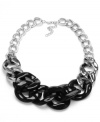 Stun 'em in statement-making style. Haskell's large frontal necklace combines interlocking links in silver and black tone mixed metal. Approximate length: 20 inches + 3-inch extender. Approximate drop: 2 inches.