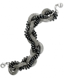 Twists worth shouting over. Alfani's alluring bracelet combines woven silver tone mesh chains and hematite beads for an intriguing look. Set in imitation rhodium mixed metal. Approximate length: 8 inches + 1-inch extender. Twists worth shouting over. Alfani's alluring bracelet combines woven silver tone mesh chains and hematite beads for an intriguing look. Set in imitation rhodium mixed metal. Approximate length: 8 inches + 1-inch extender.