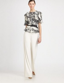 This silky style is printed with a graphic, abstract pattern and adorned with feminine ruffled trim.Jewel necklineShort sleevesButton frontRuffles at front, shoulders, and hemlineBelt includedSilk lining55% viscose/45% silkDry cleanMade in USA of Italian fabricModel shown is 5'11 (180cm) wearing US size 4. This silky style is printed with a graphic, abstract pattern and adorned with feminine ruffled trim.Jewel necklineShort sleevesButton frontRuffles at front, shoulders, and hemlineBelt includedSilk lining55% viscose/45% silkDry cleanMade in USA of Italian fabricModel shown is 5'11 (180cm) wearing US size 4.