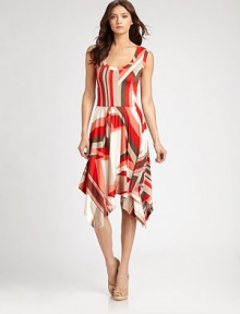 A vibrant, graphic pattern lends a modern edge to this pull-on, wear-everywhere style.ScoopneckSleevelessWaist seamBias-cut skirtHandkerchief hemFully linedAbout 31 from natural waist92% polyester/8% spandexImportedMade in USA of imported fabricModel shown is 5'11 (180) wearing US size Small. A vibrant, graphic pattern lends a modern edge to this pull-on, wear-everywhere style.ScoopneckSleevelessWaist seamBias-cut skirtHandkerchief hemFully linedAbout 31 from natural waist92% polyester/8% spandexImportedMade in USA of imported fabricModel shown is 5'11 (180) wearing US size Small.
