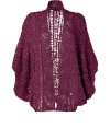 Channel the look of the moment in this draped oversized cardigan from Anna Sui - Open silhouette, draped dolman sleeves, loose knit, oversized fit - Pair with an oversized blouse, skinny leather pants, and platform pumps