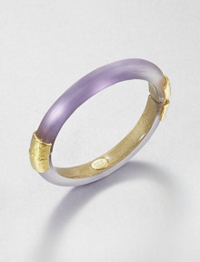 From the Lucite Collection. A sleek bangle of hand-sculpted, hand-painted Lucite, accented with crinkle-textured goldtone bands at the hinge and closure.LuciteGoldtoneDiameter, about 2.5Width, about .4Hinged, with magnetic closureMade in USA From the Lucite Collection. A sleek bangle of hand-sculpted, hand-painted Lucite, accented with crinkle-textured goldtone bands at the hinge and closure.LuciteGoldtoneDiameter, about 2.5Width, about .4Hinged, with magnetic closureMade in USA