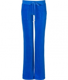 Styled this season with a slightly wider waistband and slimmer cut around the knee, Juicy Coutures iconic pants fit better now than ever! - Drawstring waistline, flared leg, snapped back pockets, shiny gold-toned hardware - Figure-hugging fit, sits low on the hips - Style with a tee and cozy pullover, or for a sportier look, with a matching hoodie and flats