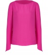 Take a minimalist stance on sophistication in Tara Jarmons bright tunic top, complete with asymmetrical cuffs for an understated modern finish - Rounded-neckline, long sleeves, slim silhouette - Style with skinny jeans, tailored business separates, or cropped trousers, and finish with ballerinas or sky-high pumps