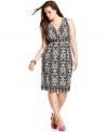 Delight from desk to dinner with INC's sleeveless plus size dress, accentuated by an empire waist.