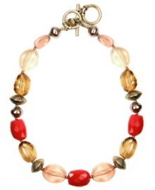 Natural beauty. Jones New York blends pink, amber, coral, and cream-colored plastic beads for an organically-chic necklace. Beaded accents and toggle clasp set in mixed metal. Approximate length: 17 inches + 2-inch extender. Natural beauty. Jones New York blends pink, amber, coral, and cream-colored plastic beads for an organically-chic necklace. Beaded accents and toggle clasp set in mixed metal. Approximate length: 17 inches + 2-inch extender.