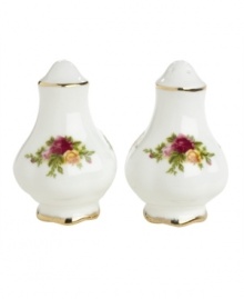 This popular bone china pattern surrounds blooming sprays of colorful English roses with hand-applied bands of 22K gold. Shown at front center. This popular bone china pattern surrounds blooming sprays of colorful English roses with hand-applied bands of 22K gold. Shown at front center.