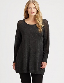 Designed to turn heads, a relaxed-fit sweater with glamorous shimmer, alluring mesh sleeves and classic ribbed-knit trim. Wear this style with leggings or denim leggings for an enviable everyday look. Round neckRaglan sleevesRibbed trimPull-on styleAbout 31 from shoulder to hemMerino wool/polyester/metallic threadDry cleanImported Designed to turn heads, a relaxed-fit sweater with glamorous shimmer, alluring mesh sleeves and classic ribbed-knit trim. Wear this style with leggings or denim leggings for an enviable everyday look. Round neckRaglan sleevesRibbed trimPull-on styleAbout 31 from shoulder to hemMerino wool/polyester/metallic threadDry cleanImported