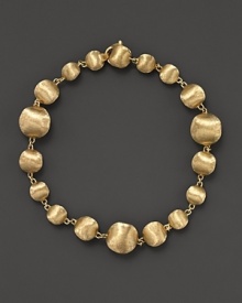 Gleaming beads of textured 18K yellow gold, exclusively for Bloomingdale's from the Marco Bicego Africa collection. Gleaming beads of textured 18K yellow gold, exclusively for Bloomingdale's from the Marco Bicego Africa collection.