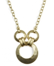 Industrial chic meets rustic charm in this unique triple ring pendant from Jones New York. Hammered texture necklace crafted from gold-plated mixed metal. Approximate length: 18 inches. Approximate drop: 2 inches. Industrial chic meets rustic charm in this unique triple ring pendant from Jones New York. Hammered texture necklace crafted from gold-plated mixed metal. Approximate length: 18 inches. Approximate drop: 2 inches.