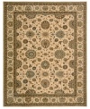 Floral medallions connected by a complex labyrinth of vines distinguish the well-composed design of this rug. Machine woven from the highest quality wool and meticulously dyed for a richly varied color palette to bring a unique accent of luxury to the home.