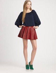 The classic peasant blouse elevated in dreamy matte silk for that light, feminine look that Alice + Olivia is known for.Smocked boatneckGathered sleevesSmocked cuffsElastic waistPullover styleSilkDry cleanImportedModel shown is 5'8½ (174cm) wearing US size Small. The classic peasant blouse elevated in dreamy matte silk for that light, feminine look that Alice + Olivia is known for.Smocked boatneckGathered sleevesSmocked cuffsElastic waistPullover styleSilkDry cleanImportedModel shown is 5'8½ (174cm) wearing US size Small.