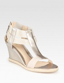 A demi-wedge lifts this t-strap silhouette rendered in opalescent leather with textured rope edging. Self-covered wedge, 2¾ (70mm)Pearlized patent leather upper with elastic straps and espadrille trimBack zipLeather lining and solePadded insoleMade in Italy A demi-wedge lifts this t-strap silhouette rendered in opalescent leather with textured rope edging. Self-covered wedge, 2¾ (70mm)Pearlized patent leather upper with elastic straps and espadrille trimBack zipLeather lining and solePadded insoleMade in Italy
