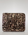 Your iPad flaunts this season's glamour trend with a sequin-suited sleeve from Lodis Accessories--a shimmering little number for your choice gadget.