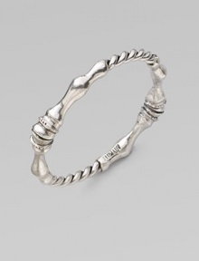 A truly unique design of connecting horse hooves and twisted rope, all in an antiqued-finish. SilvertoneDiameter, about 3½Slip-on styleMade in USA A truly unique design of connecting horse hooves and twisted rope, all in an antiqued-finish. SilvertoneDiameter, about 3½Slip-on styleMade in USA