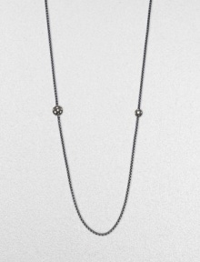 From the Starlight Collection. A long, lovely box chain of blackened sterling silver, punctuated by two spheres set with twinkling diamonds.Diamonds, .97 tcwSterling silverLength, about 36Lobster claspImported