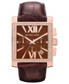 This oversized Gia watch in rosy hues shines with crystal accents, by Michael Kors.