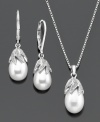 Inspired by nature, this beautiful pendant and earrings set features cultured freshwater pearl (8-11 mm) and diamond accents set in sterling silver. Pendant measures approximately 18 inches with a 3/4-inch drop. Earrings measure approximately 1 inch.