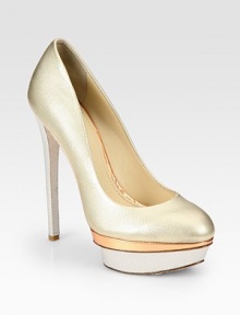 Timeless metallic leather style modernized by an edgy stingray print and sculpted island platform. Self-covered heel, 5½ (140mm)Island platform, 1½ (40mm)Compares to a 4 heel (100mm)Stingray-print leather upperLeather lining and solePadded insoleMade in ItalyOUR FIT MODEL RECOMMENDS ordering one half size down as this style runs large. Timeless metallic leather style modernized by an edgy stingray print and sculpted island platform. Self-covered heel, 5½ (140mm)Island platform, 1½ (40mm)Compares to a 4 heel (100mm)Stingray-print leather upperLeather lining and solePadded insoleMade in ItalyOUR FIT MODEL RECOMMENDS ordering one half size down as this style runs large.