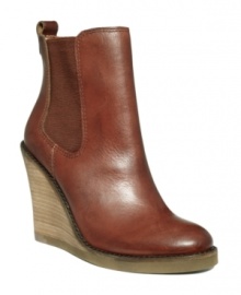 Stretch detailing and a simple slip-on silhouette add a combination of comfort and ease to Lucky Brand's leather Fadora ankle boots. With a 4-1/2 stacked wedge heel. Stretch detailing and a simple slip-on silhouette add a combination of comfort and ease to Lucky Brand's leather Fadora ankle boots. With a 4-1/2 stacked wedge heel.