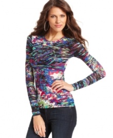 A bright painterly print adds a bold splash of color to this BCBGMAXAZRIA top -- perfect for adding a pop of pattern to your cold-weather look! A bright painterly print adds a bold splash of color to this BCBGMAXAZRIA top -- perfect for adding a pop of pattern to your cold-weather look!