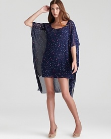 Mara Hoffman's star-printed poncho doubles up for daytime as a dress or swim cover-up. Ditch the slip when beach-bound to flaunt an equally chic bikini. Mara Hoffman's star-printed poncho doubles up for daytime as a dress or swim cover-up. Ditch the slip when beach-bound to flaunt an equally chic bikini.