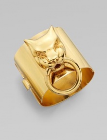 This statement piece features a tiger door knocker on a wide bangle. BrassDiameter, about 2Width, about 2Hinged closureMade in Italy This statement piece features a tiger door knocker on a wide bangle. BrassDiameter, about 2Width, about 2Hinged closureMade in Italy