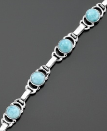 Elegant and refreshing, this bracelet melds luminous sterling silver with larimar. Measures approximately 8 inches long. Elegant and refreshing, this bracelet melds luminous sterling silver with larimar. Measures approximately 8 inches long.