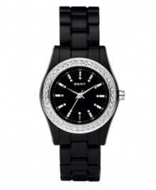 Starry night sky style, by DKNY. Watch crafted of black plastic bracelet and round case. Stainless steel bezel embellished with crystal accents. Black dial features silver tone stick indices, crystal accents at markers, minute track, three hands and logo. Quartz movement. Water resistant to 50 meters. Two-year limited warranty. Starry night sky style, by DKNY. Watch crafted of black plastic bracelet and round case. Stainless steel bezel embellished with crystal accents. Black dial features silver tone stick indices, crystal accents at markers, minute track, three hands and logo. Quartz movement. Water resistant to 50 meters. Two-year limited warranty.