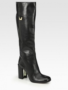 A tall and sleek design rendered in supple leather with logoed hardware. Self-covered heel with a metal insert, 3½ (90mm)Shaft, 15½Leg circumference, 14Leather upperPartial side zipPull-on styleLeather liningLeather and rubber solePadded insoleImported A tall and sleek design rendered in supple leather with logoed hardware. Self-covered heel with a metal insert, 3½ (90mm)Shaft, 15½Leg circumference, 14Leather upperPartial side zipPull-on styleLeather liningLeather and rubber solePadded insoleImported