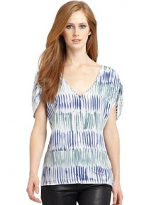 THE LOOKAllover abstract printCinched detail at shouldersV-neckTHE FITAbout 27 from shoulder to hemTHE MATERIALSilkCARE & ORIGINMachine washMade in USAModel shown is 5'9½ (176cm) wearing US size Small. THE LOOKAllover abstract printCinched detail at shouldersV-neckTHE FITAbout 27 from shoulder to hemTHE MATERIALSilkCARE & ORIGINMachine washMade in USAModel shown is 5'9½ (176cm) wearing US size Small.