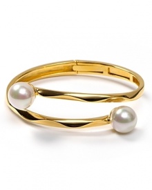 Gold makes an impact with Majorica's ripple bracelet finished with delicate pearl tips. Gold makes an impact with Majorica's ripple bracelet finished with delicate pearl tips.