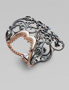 From the Les Dents De La Mere Collection. A rose gold plated shark jaw is hidden within an ornate filigree design of blackened sterling silver.Rose gold plated sterling silver Black rhodium plated sterling silver Diameter, about 2½ Imported