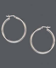 Simple hoops add an extra special touch, and Touch of Silver's smooth style is no exception. Crafted in silver-plated brass with a sterling silver click backing. Approximate diameter: 1-2/5 inches. Simple hoops add an extra special touch, and Touch of Silver's smooth style is no exception. Crafted in silver-plated brass with a sterling silver click backing. Approximate diameter: 1-2/5 inches.