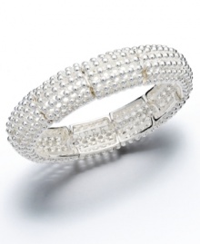 Perfect for a glamorous evening affair, or simple every day style. This Alfani bracelet features easy slip-on style crafted in silver tone mixed metal with a unique shot bead design. Bracelet stretches to fit wrist. Approximate length: 7-1/2 inches. Approximate diameter: 2 inches. Perfect for a glamorous evening affair, or simple every day style. This Alfani bracelet features easy slip-on style crafted in silver tone mixed metal with a unique shot bead design. Bracelet stretches to fit wrist. Approximate length: 7-1/2 inches. Approximate diameter: 2 inches.