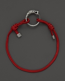 Eastern elements inform John Hardy's dragon head bracelet. It features a cotton cord band with an adjustable sliding closure. Eastern elements inform John Hardy's dragon head bracelet. It features a cotton cord band with an adjustable sliding closure.