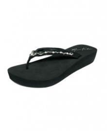A truly unique shoe. Marc Fishers Special thong sandals feature a thick, comfy sole and metal and pearl detailing along the straps. A truly unique shoe. Marc Fishers Special thong sandals feature a thick, comfy sole and metal and pearl detailing along the straps.