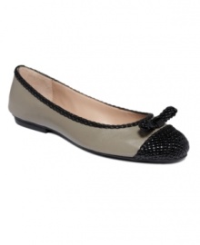 Perfectly tailored for a polished look. The Voyage flats by Tahari make your journey from day to night effortlessly chic with patent leather accents.